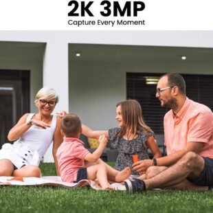 Family enjoying outdoor picnic on green lawn.